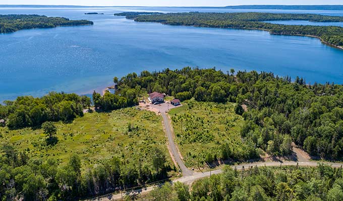 Grundstückskauf bei Canadian Pioneer Estates Ltd. - Haus am See bauen